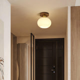 elegant-white-shell-ceiling-lamp-with-black-walnut-wood-base-and-copper-accents