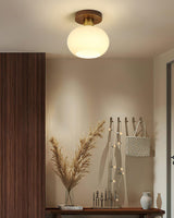 elegant-white-shell-ceiling-lamp-with-black-walnut-wood-base-and-copper-accents