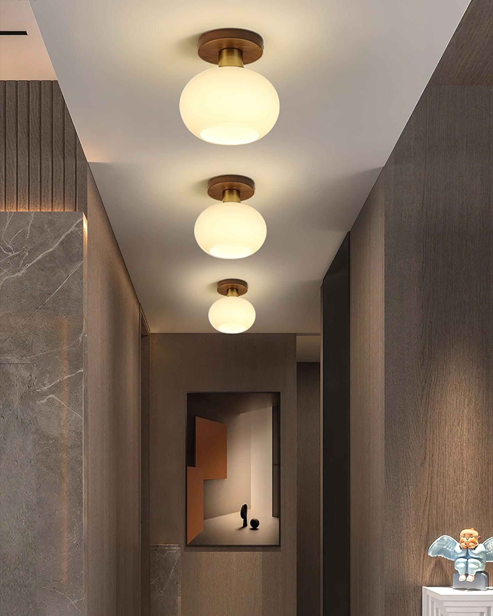 elegant-white-shell-ceiling-lamp-with-black-walnut-wood-base-and-copper-accents