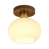 elegant-white-shell-ceiling-lamp-with-black-walnut-wood-base-and-copper-accents