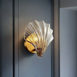 elegant-shell-shaped-brass-and-amber-glass-wall-lamp-for-modern-home-decor