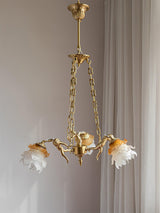 italian-aged-brass-putti-statuette-pendant-light-with-frosted-glass-globes