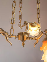 italian-aged-brass-putti-statuette-pendant-light-with-frosted-glass-globes