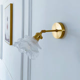 Kano Solid Brass Wall Sconce with Adjustable Arm and Clear Glass Shade for Indoor Use