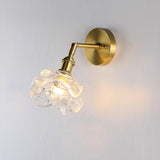 Kano Solid Brass Wall Sconce with Adjustable Arm and Clear Glass Shade for Indoor Use