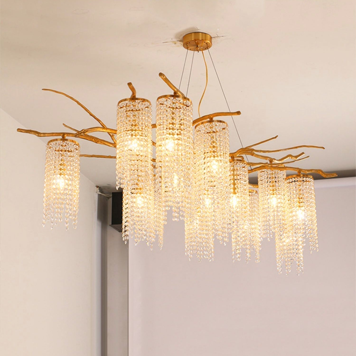 Large Nature Inspired Brass Branch Chandelier with Crystal Pendants for Modern Dining Rooms