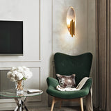 Luxury Oval Iron Wall Lamp Electroplated Postmodern Minimalist Sconce for Bedroom