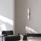 Macie Modern LED Wall Sconce with Textured Glass and Sleek Black Finish for Indoor Lighting