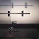 Meta Parallel Modern Linear LED Pendant Light with Natural Black Stone and Copper Accents
