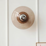 Mid Century Chrome Flying Saucer Wall Sconce with Amber Glass Shade