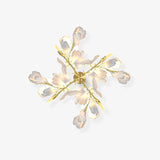 Mid Century Gold Gingko Flower Wall Sconce with Elegant White Ceramic Details for Indoor Lighting
