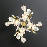 Mid Century Gold Gingko Flower Wall Sconce with Elegant White Ceramic Details for Indoor Lighting
