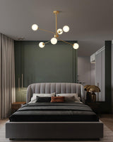 Mid Century Modern Brass Crown Chandelier with White Glass Globe Shades for Indoor Lighting