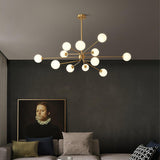 Mid Century Modern Brass Crown Chandelier with White Glass Globe Shades for Indoor Lighting