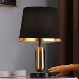 Mid Century Modern Brass Table Lamp with Fabric Shade and Black Metal Base for Bedside or Office