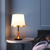 Mid Century Modern Brass Table Lamp with Fabric Shade and Black Metal Base for Bedside or Office