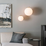 Mid Century Modern Opal Glass Globe Wall Sconce Lamp in Black and Gold