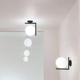 Mid Century Modern Opal Glass Globe Wall Sconce Lamp in Black and Gold