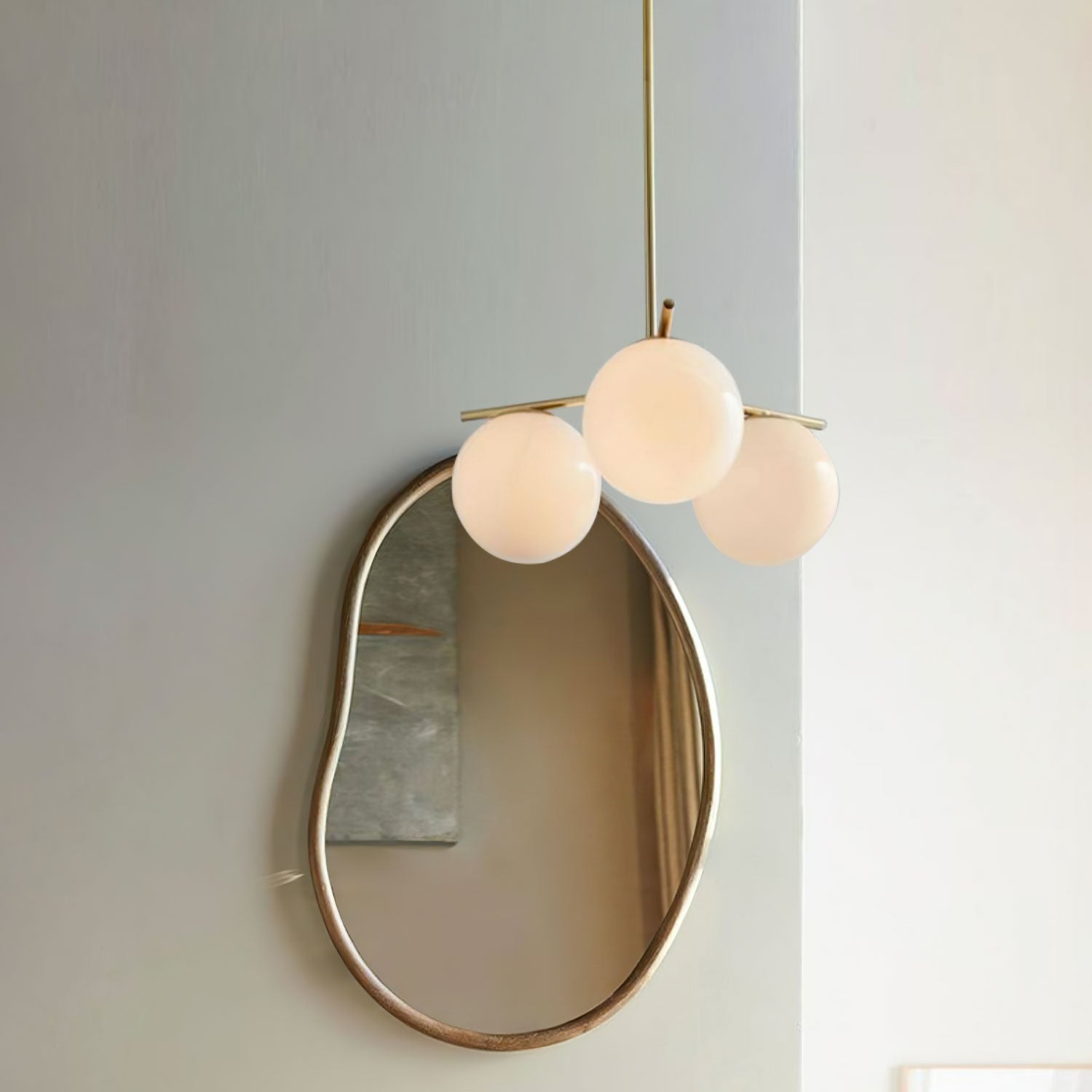 Mid Century Modern Sphere and Stem Chandelier with White Glass Globes and Brass Finish