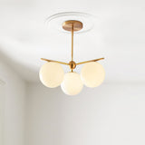 Mid Century Modern Sphere and Stem Chandelier with White Glass Globes and Brass Finish