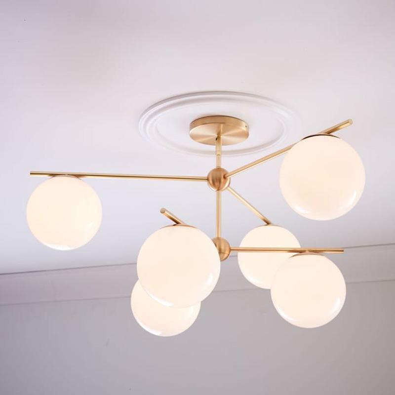 Mid Century Modern Sphere and Stem Chandelier with White Glass Globes and Brass Finish