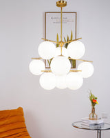 Mid Century Modern Sphere and Stem Chandelier with White Glass Globes and Brass Finish