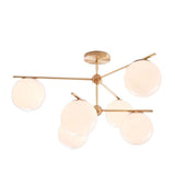 Mid Century Modern Sphere and Stem Chandelier with White Glass Globes and Brass Finish