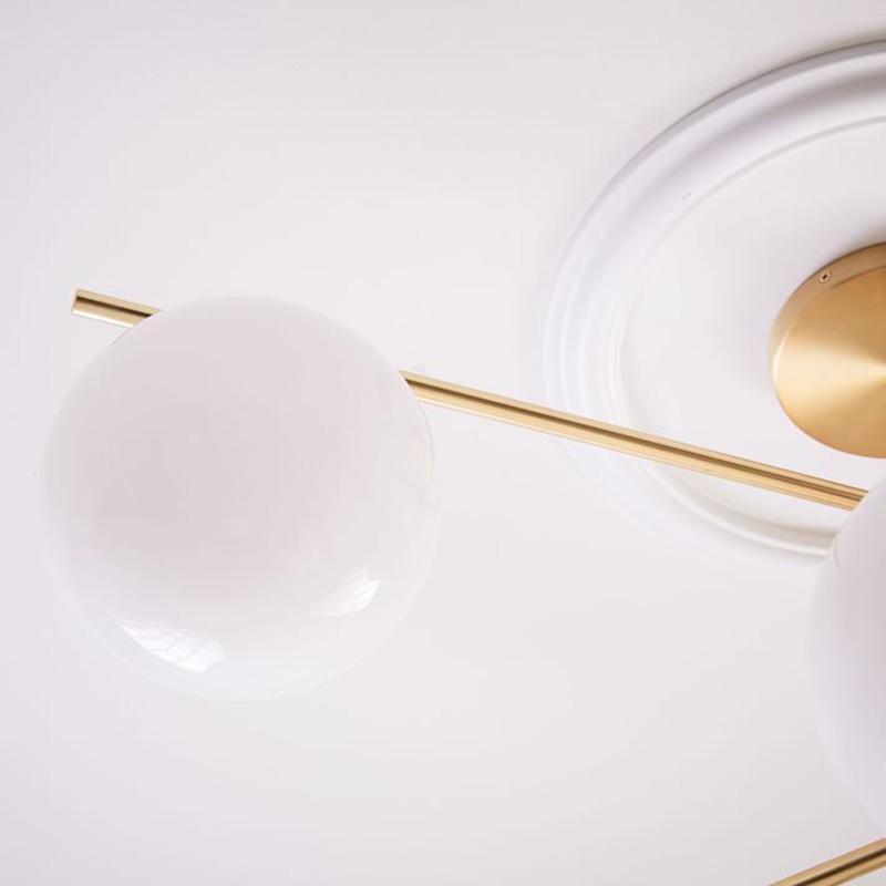 Mid Century Modern Sphere and Stem Chandelier with White Glass Globes and Brass Finish