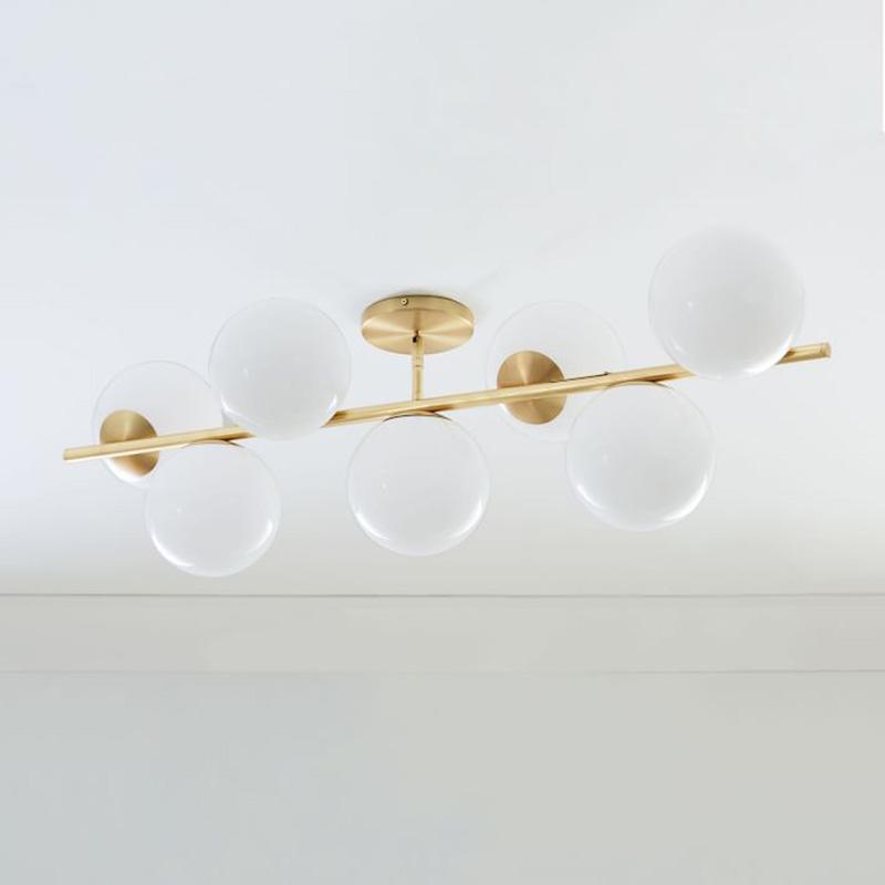 Mid Century Modern Sphere and Stem Chandelier with White Glass Globes and Brass Finish