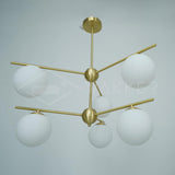 Mid Century Modern Sphere and Stem Chandelier with White Glass Globes and Brass Finish