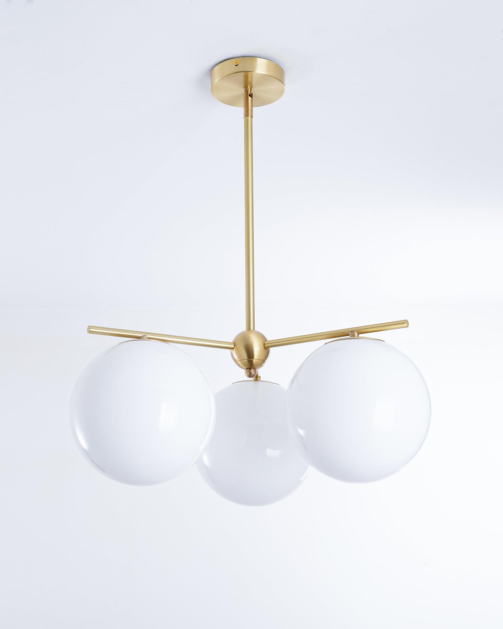 Mid Century Modern Sphere and Stem Chandelier with White Glass Globes and Brass Finish