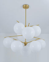 Mid Century Modern Sphere and Stem Chandelier with White Glass Globes and Brass Finish