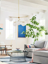 Mid Century Modern Sphere and Stem Chandelier with White Glass Globes and Brass Finish