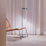 minimalist-adjustable-led-floor-lamp-with-swivel-shade-in-matte-black-finish