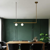 Minimalist Copper Linear Globe Pendant Light with Glass Shades for Kitchen Island and Dining Room