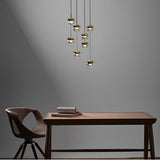 Minimalist Round LED Pendant Chandelier with Glass Globe and Adjustable Wire for Modern Homes