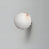 Modern Alabaster Mini Orb Wall Lamp Spherical Natural Stone Sconce for Interior Spaces