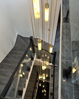 Modern Alabaster Pendant Light with Brass Finish and Integrated LED Lighting for Luxury Interiors