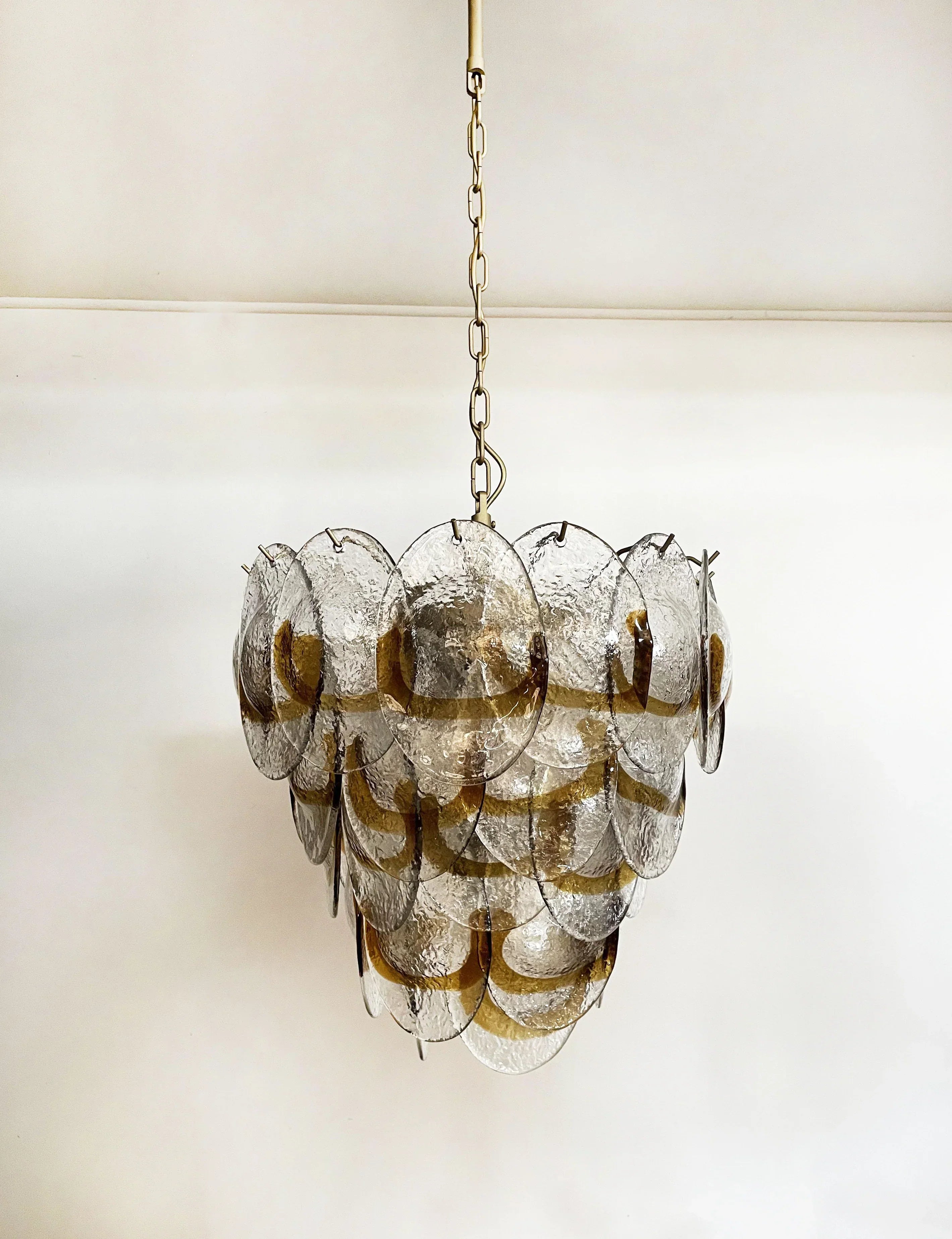 modern-amber-and-transparent-glass-sheet-chandelier-with-gold-or-chrome-metal-frame