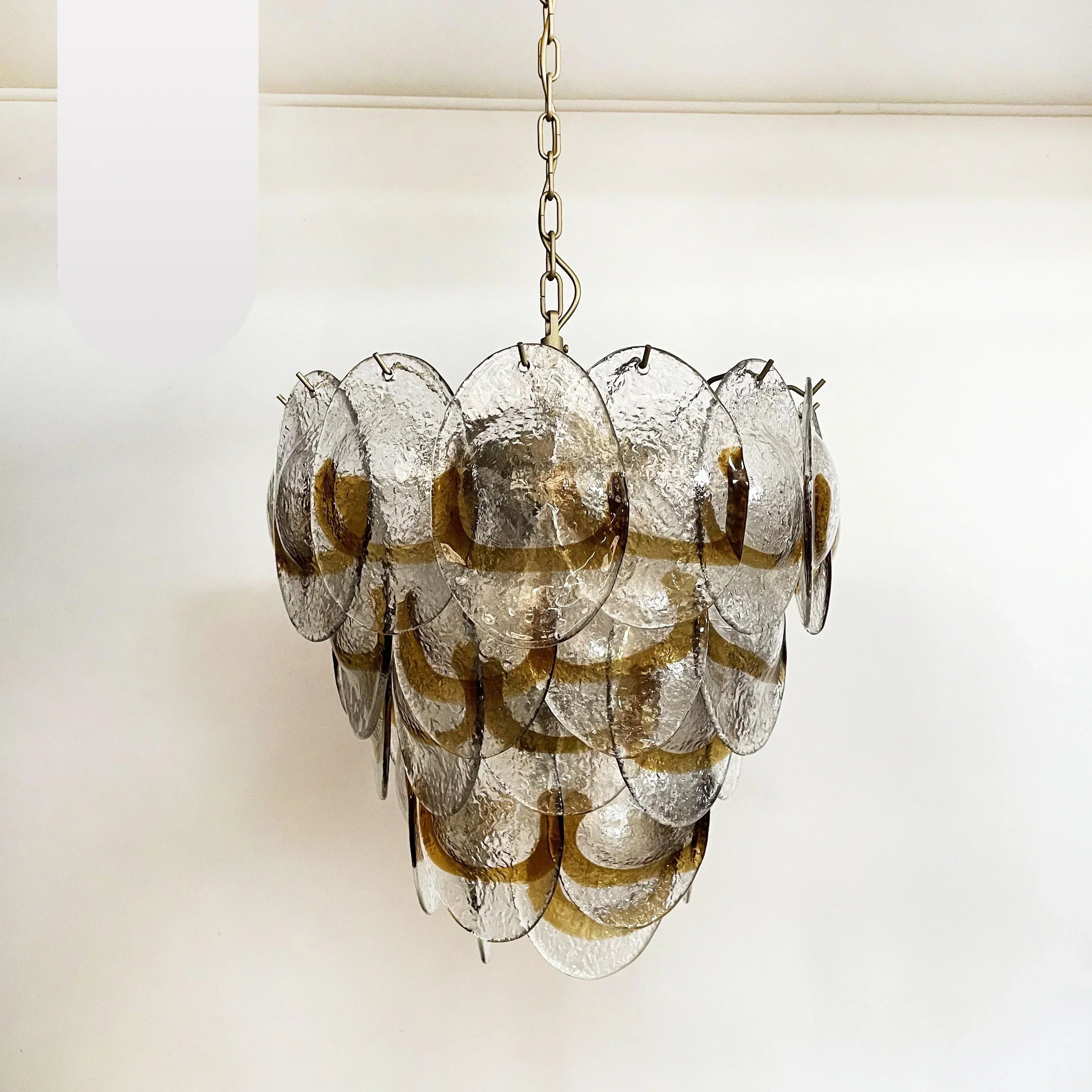 modern-amber-and-transparent-glass-sheet-chandelier-with-gold-or-chrome-metal-frame