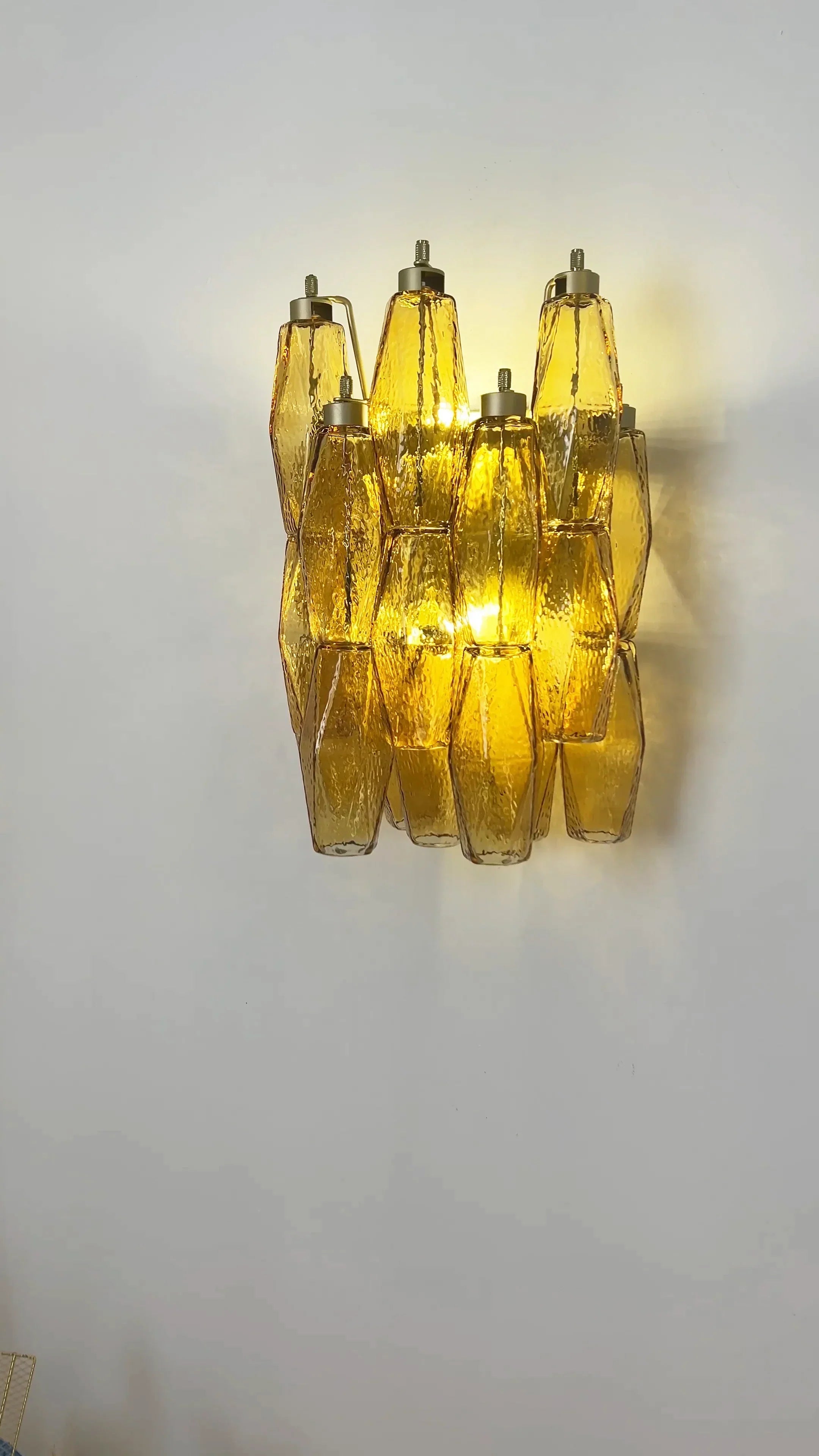 modern-amber-murano-glass-poliedri-sconce-pair-with-brass-finish-for-luxury-interiors