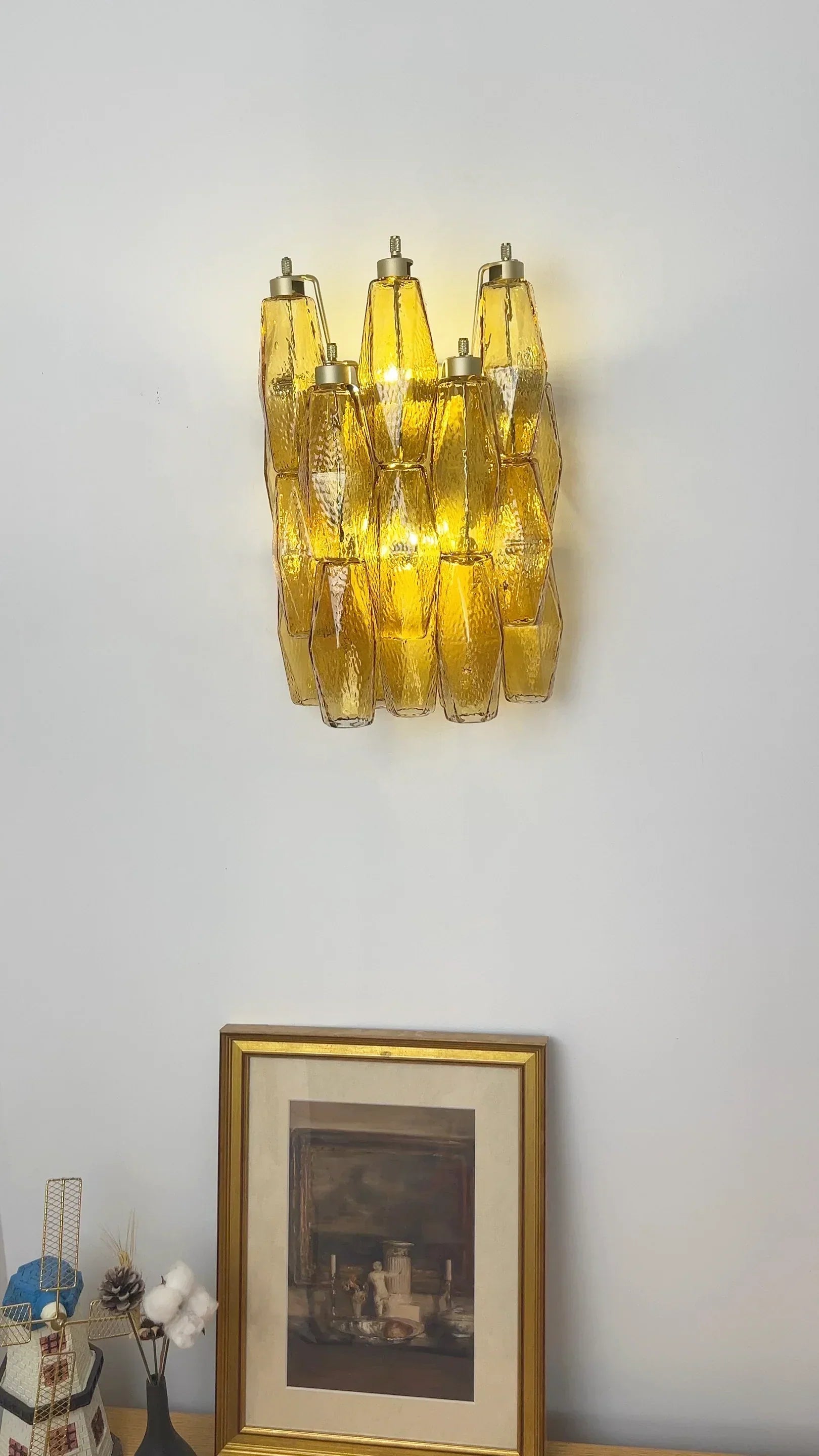 modern-amber-murano-glass-poliedri-sconce-pair-with-brass-finish-for-luxury-interiors