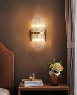 Modern Art Deco Crystal Wall Sconce with Brass Finish and Multi Layered Glass Rods
