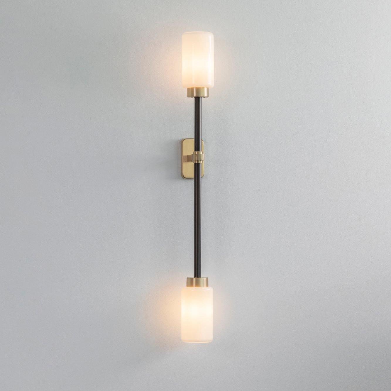 Modern Asymmetric Brass Wall Sconce with Cylindrical Glass Shades for Luxury Interiors