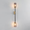 Modern Asymmetric Brass Wall Sconce with Cylindrical Glass Shades for Luxury Interiors