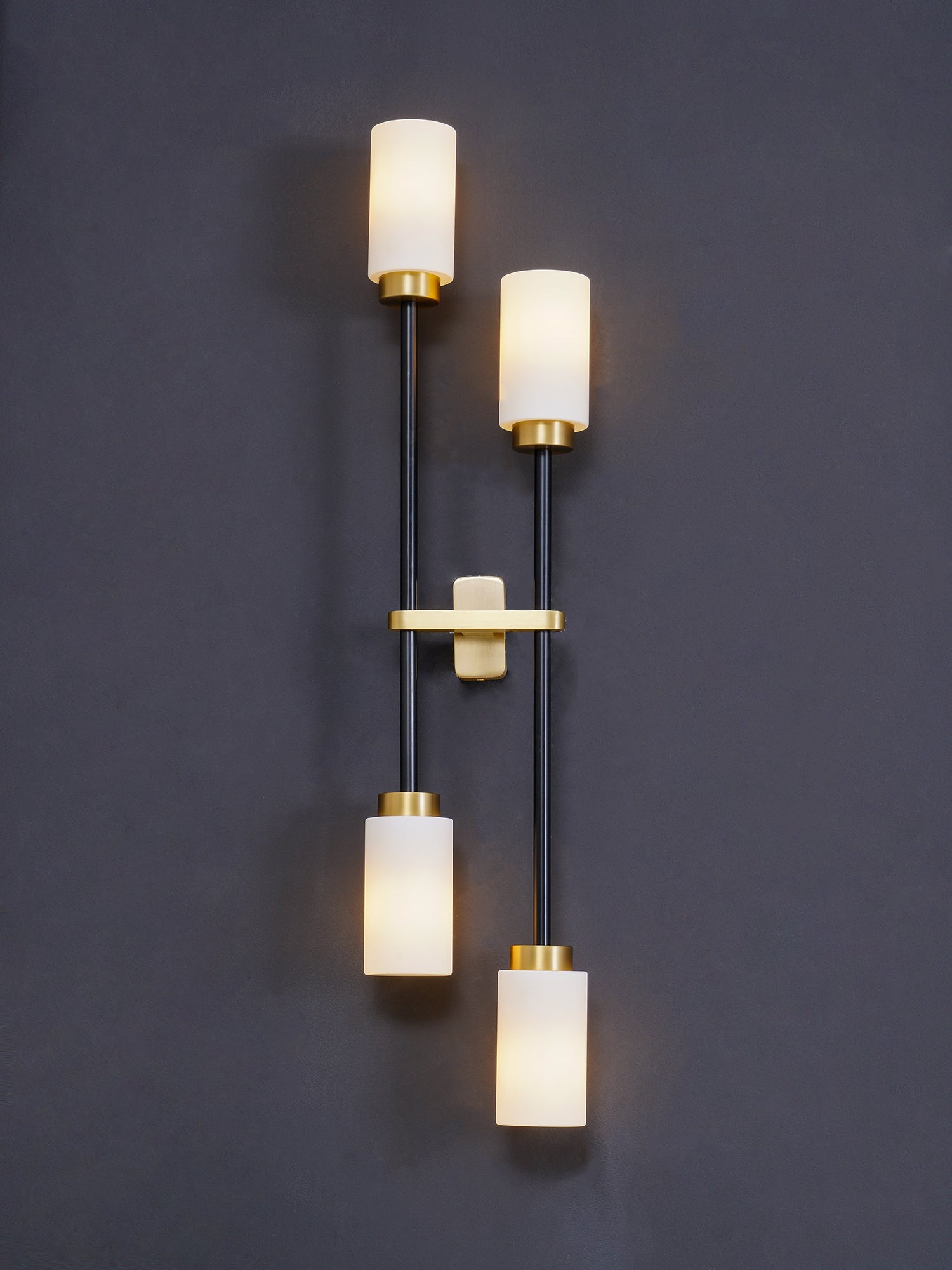 Modern Asymmetric Brass Wall Sconce with Cylindrical Glass Shades for Luxury Interiors