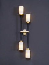 Modern Asymmetric Brass Wall Sconce with Cylindrical Glass Shades for Luxury Interiors