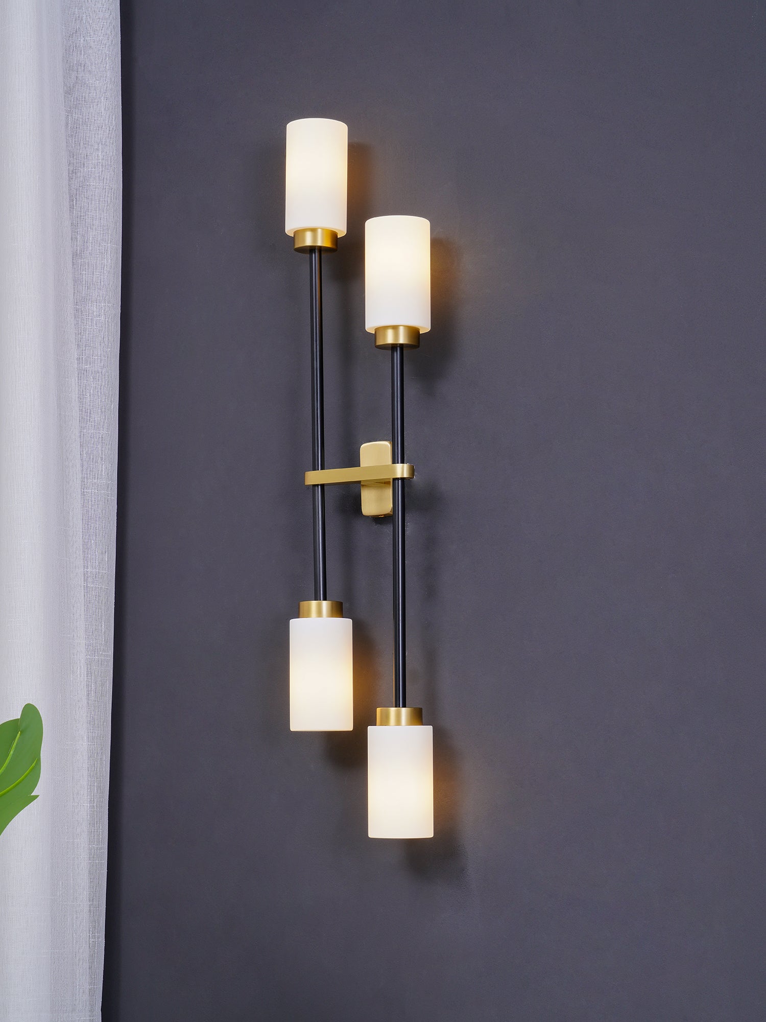 Modern Asymmetric Brass Wall Sconce with Cylindrical Glass Shades for Luxury Interiors