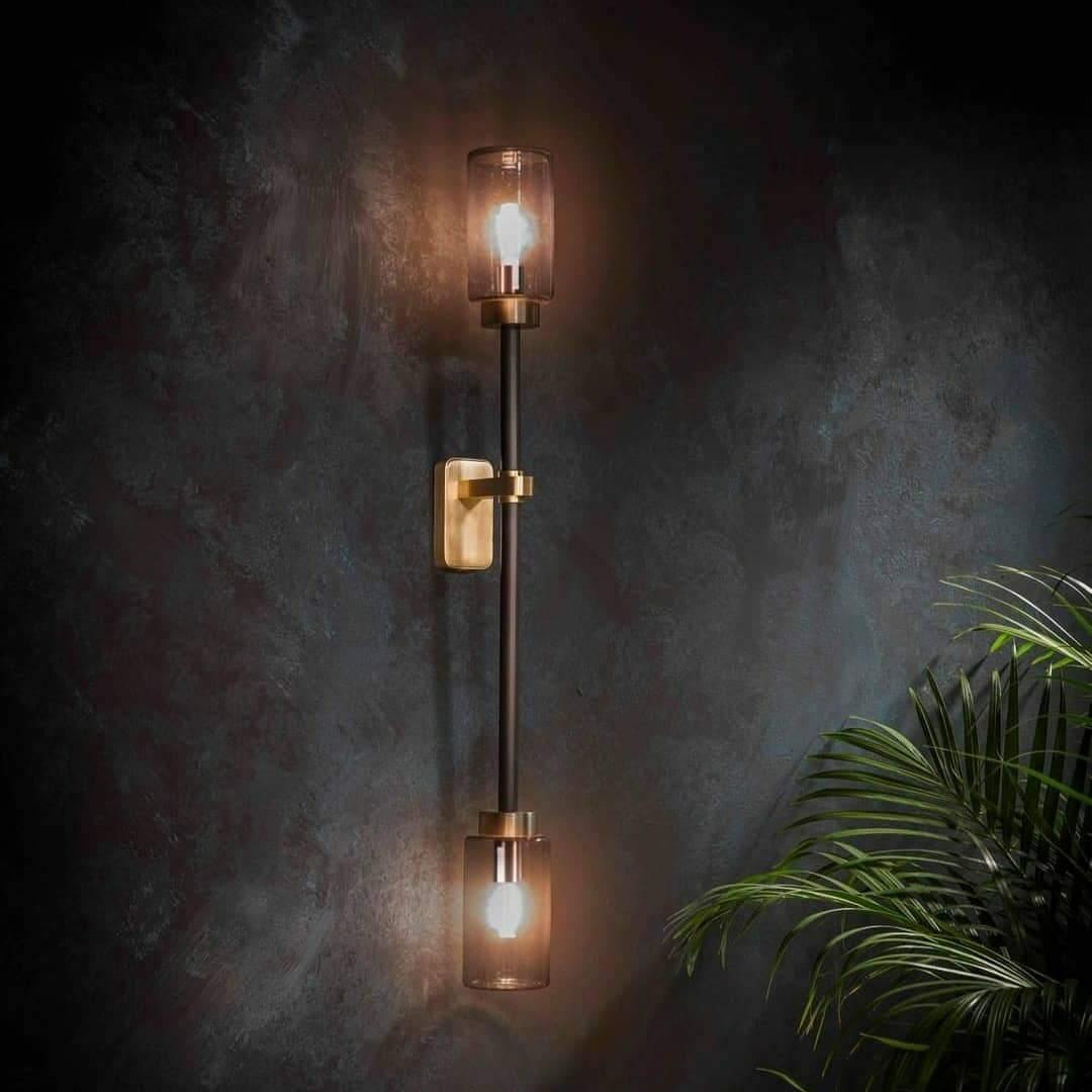 Modern Asymmetric Brass Wall Sconce with Cylindrical Glass Shades for Luxury Interiors