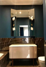 Modern Asymmetric Brass Wall Sconce with Cylindrical Glass Shades for Luxury Interiors